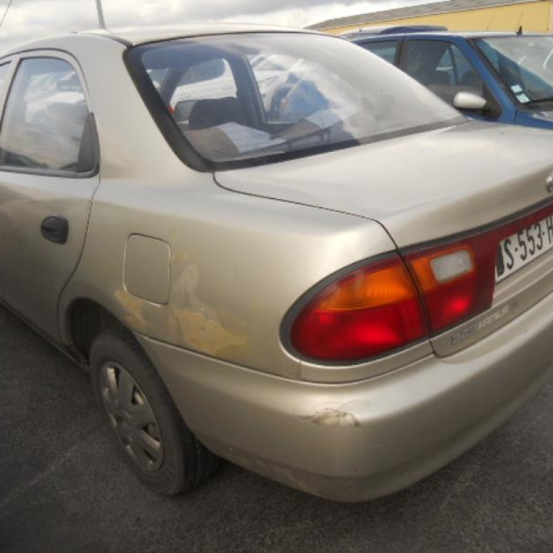 Pare choc arriere MAZDA 323 5 Photo n°6