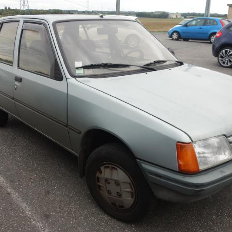 Leve vitre mecanique arriere gauche PEUGEOT 205 Photo n°3