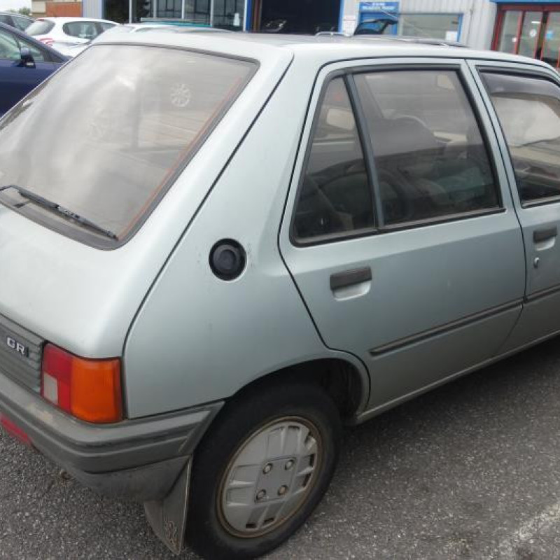 Leve vitre mecanique arriere gauche PEUGEOT 205 Photo n°4