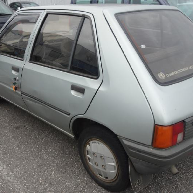 Leve vitre mecanique arriere gauche PEUGEOT 205 Photo n°5