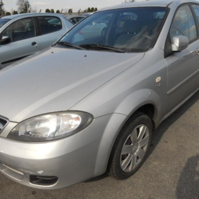 Interrupteur de leve vitre arriere droit DAEWOO LACETTI Photo n°4