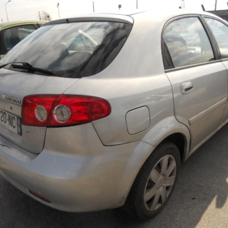 Interrupteur de leve vitre arriere droit DAEWOO LACETTI Photo n°6