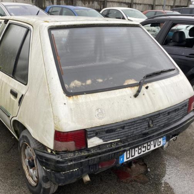 Poignee porte arriere gauche PEUGEOT 205 Photo n°9